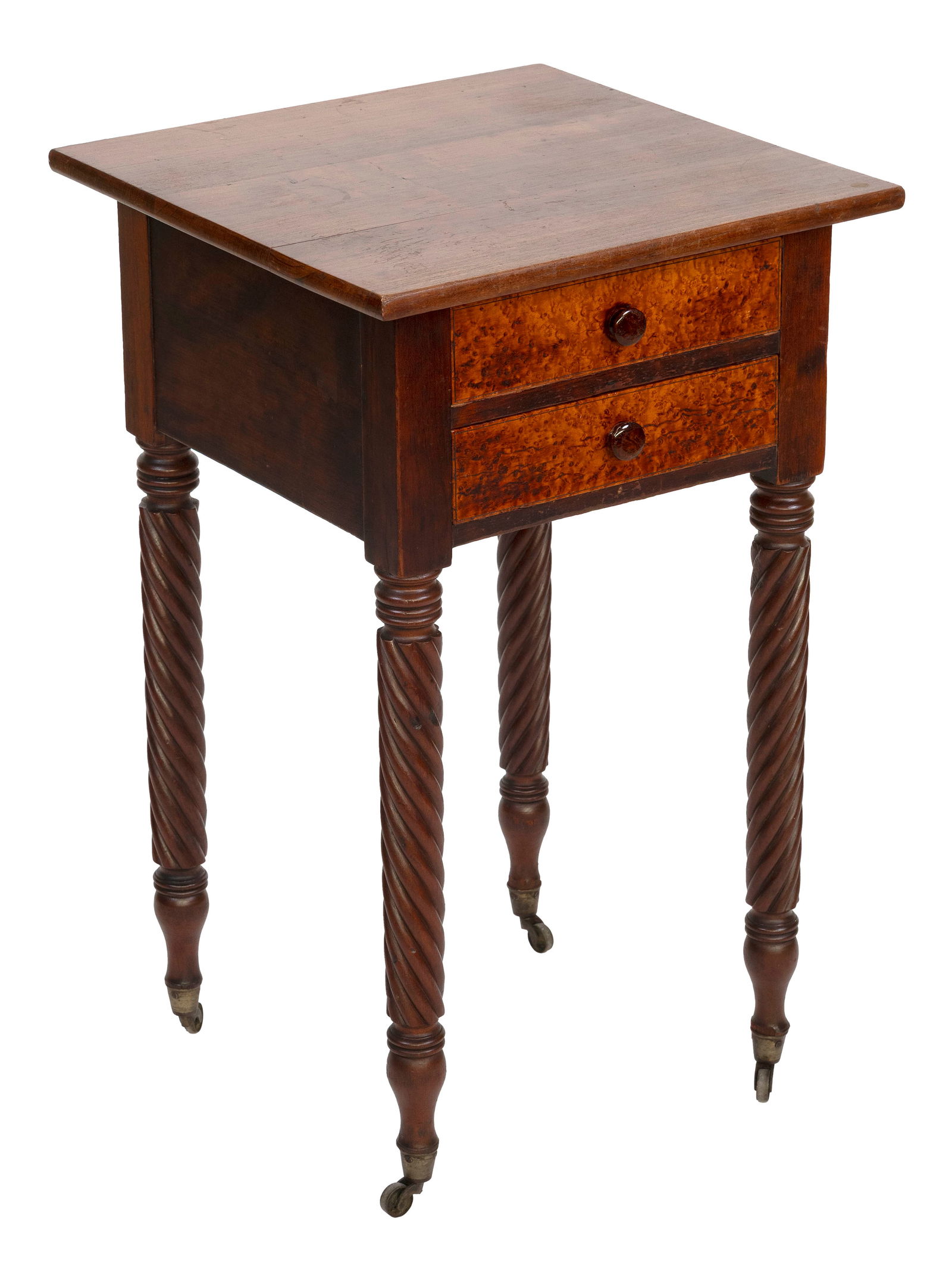SHERATON MAPLE AND BIRD'S-EYE MAPLE TWO-DRAWER STAND Circa 1820 Height 31.5". Width 19". Depth: SHERATON MAPLE AND BIRD'S-EYE MAPLE TWO-DRAWER STANDCirca 1820Turned legs fitted with casters.Height 31.5". Width 19". Depth 19.5".