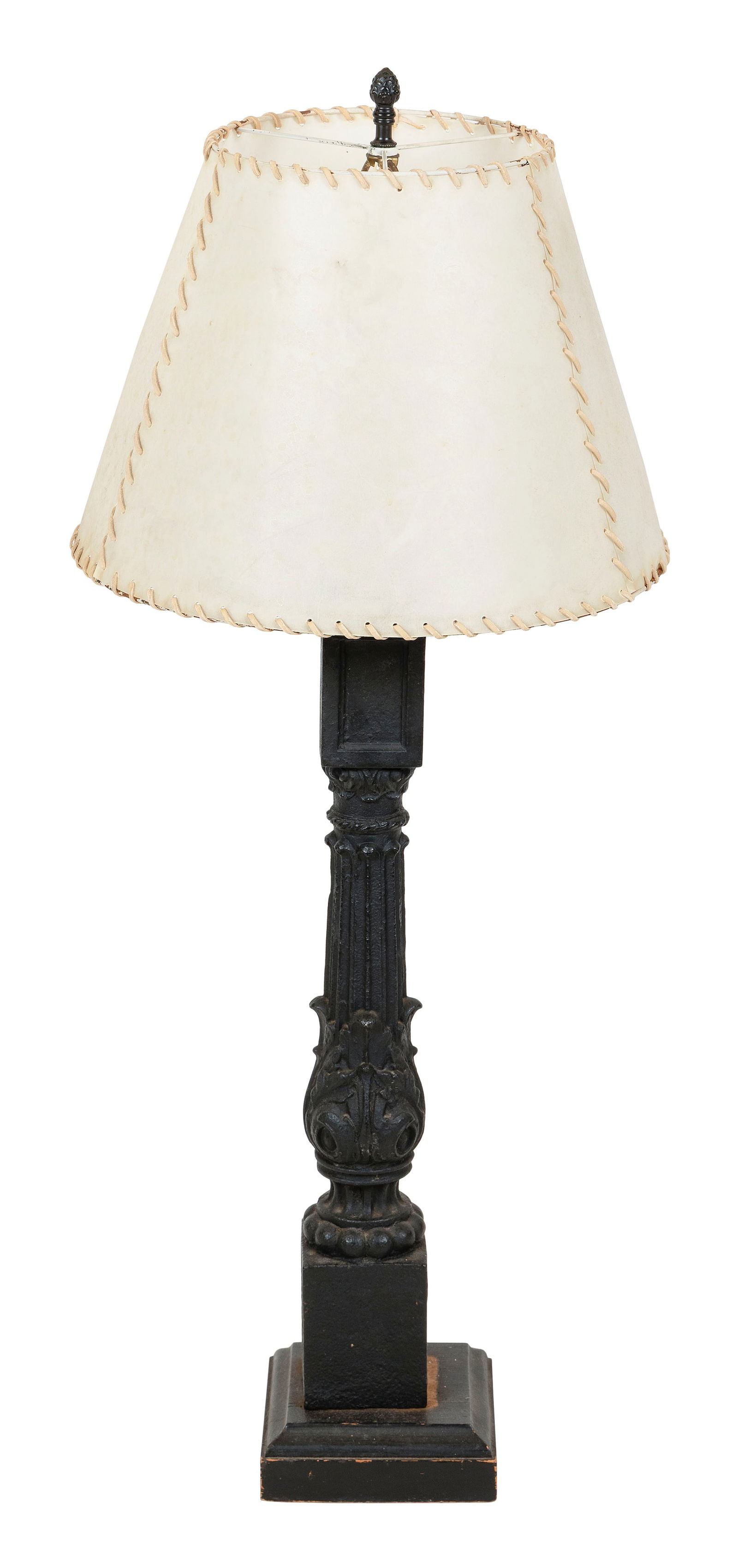 VICTORIAN WROUGHT IRON NEWEL POST BASE MOUNTED AS A TABLE LAMP Height 36.5".: VICTORIAN WROUGHT IRON NEWEL POST BASE MOUNTED AS A TABLE LAMPPainted black and mounted on a wood base. Includes parchment whipstitched shade.Height 36.5".