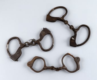 THREE PAIRS OF POLICE HANDCUFFS 19th Century Lengths 9".
