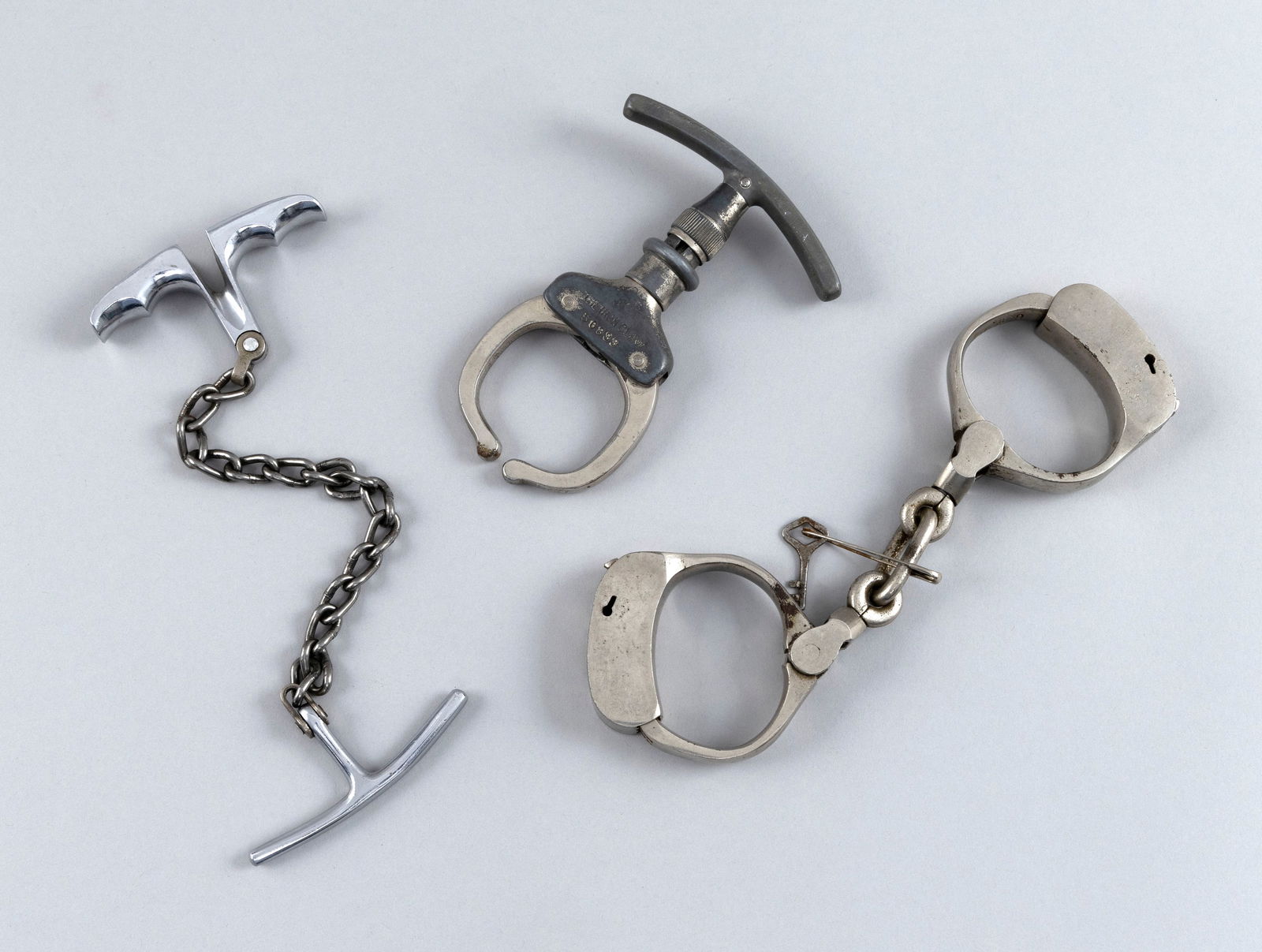 THREE POLICE RESTRAINTS Late 19th Century Lengths 9.5", 5" and 11". (1 of 2)