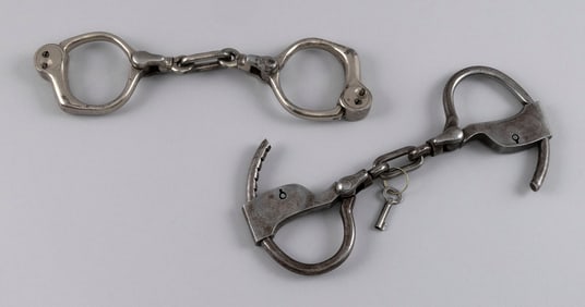TWO PAIRS OF POLICE HANDCUFFS 19th/Early 20th Century