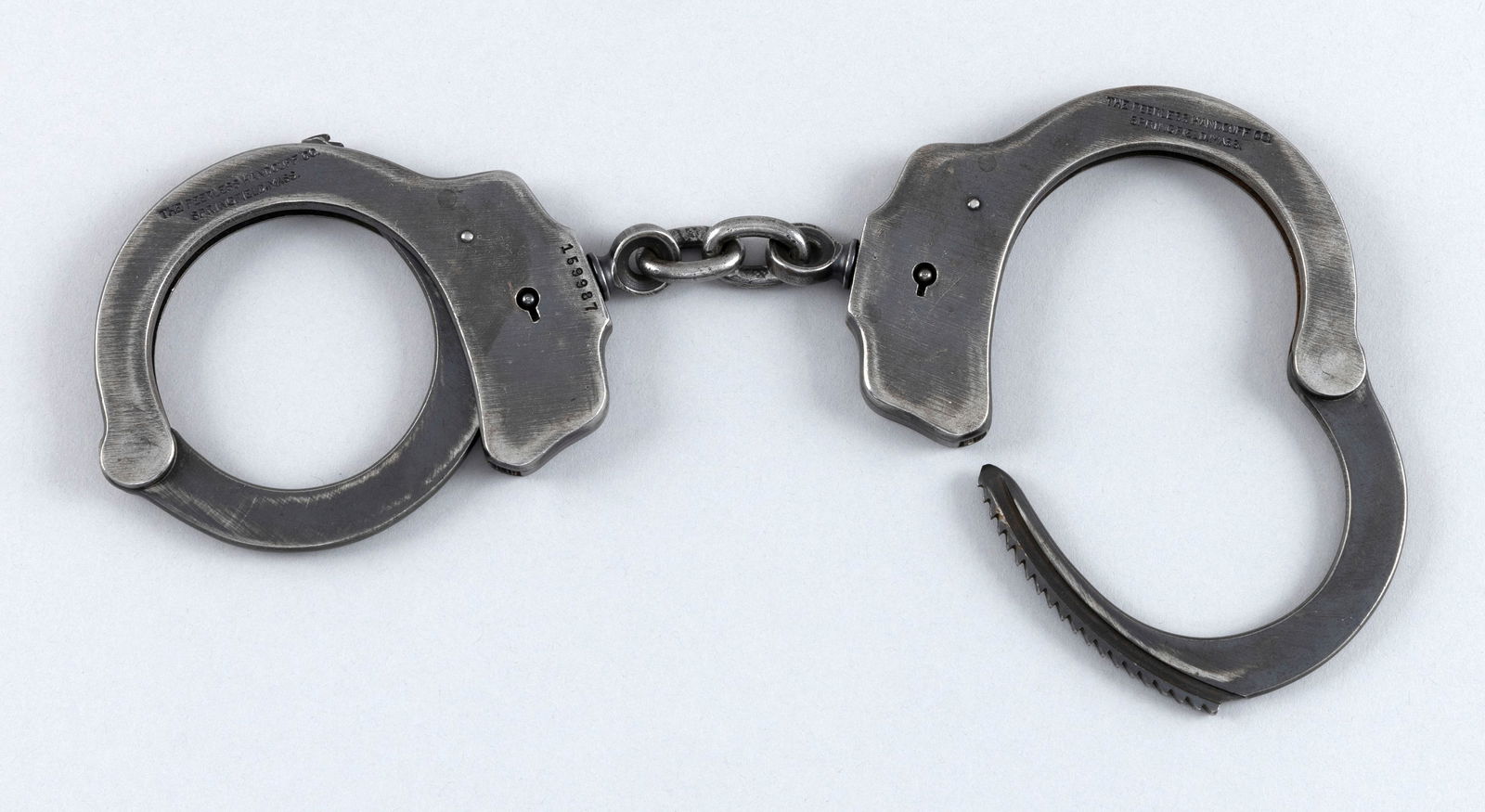 PAIR OF PEERLESS HANDCUFFS 20th Century Box length 5". (1 of 2)