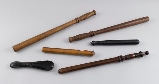 FIVE POLICE BILLY CLUBS AND A BLACKJACK 19th/20th Century Lengths from 9" to 22".