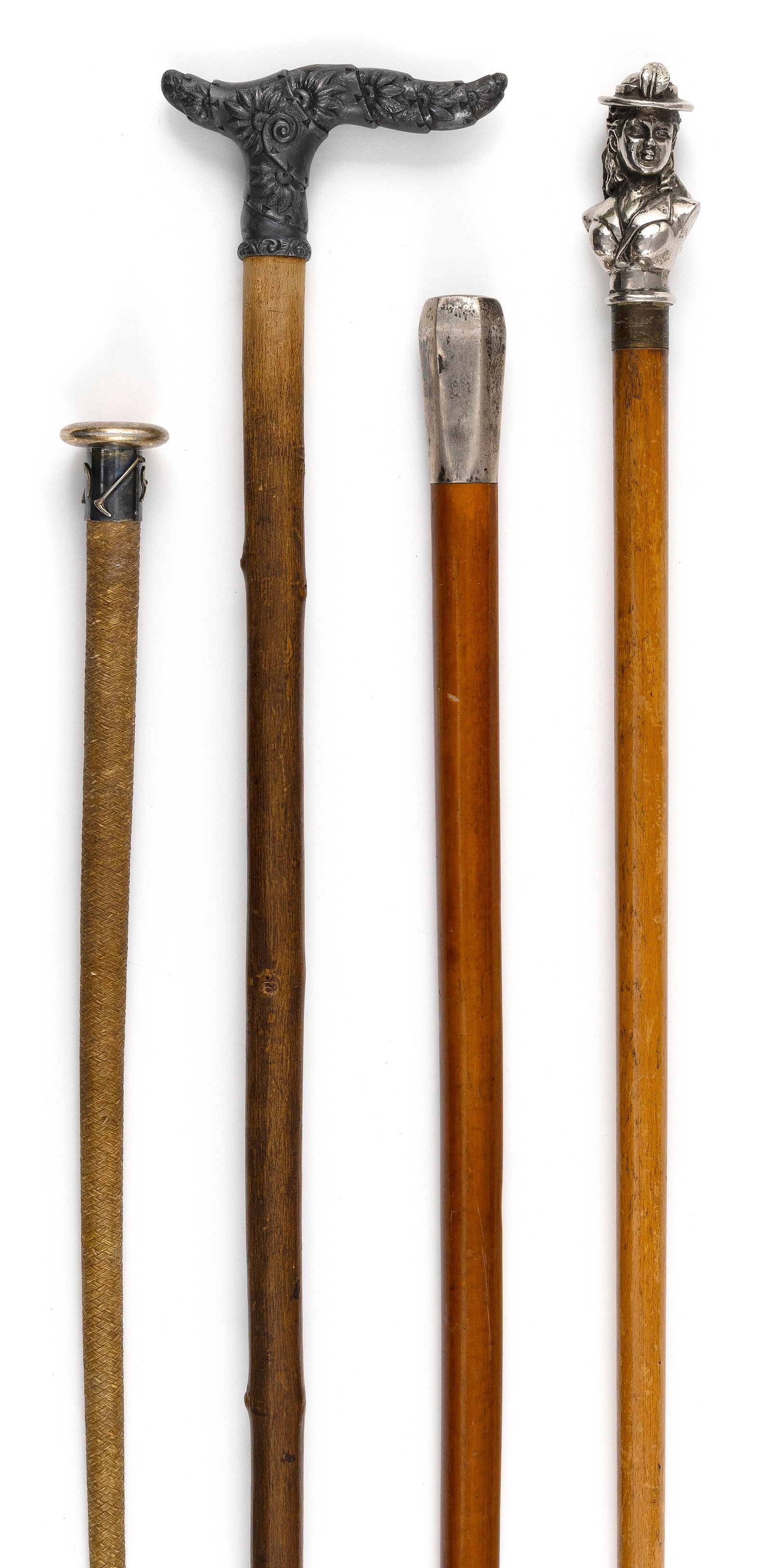 THREE CANES AND A RIDING CROP Late 19th Century (1 of 3)