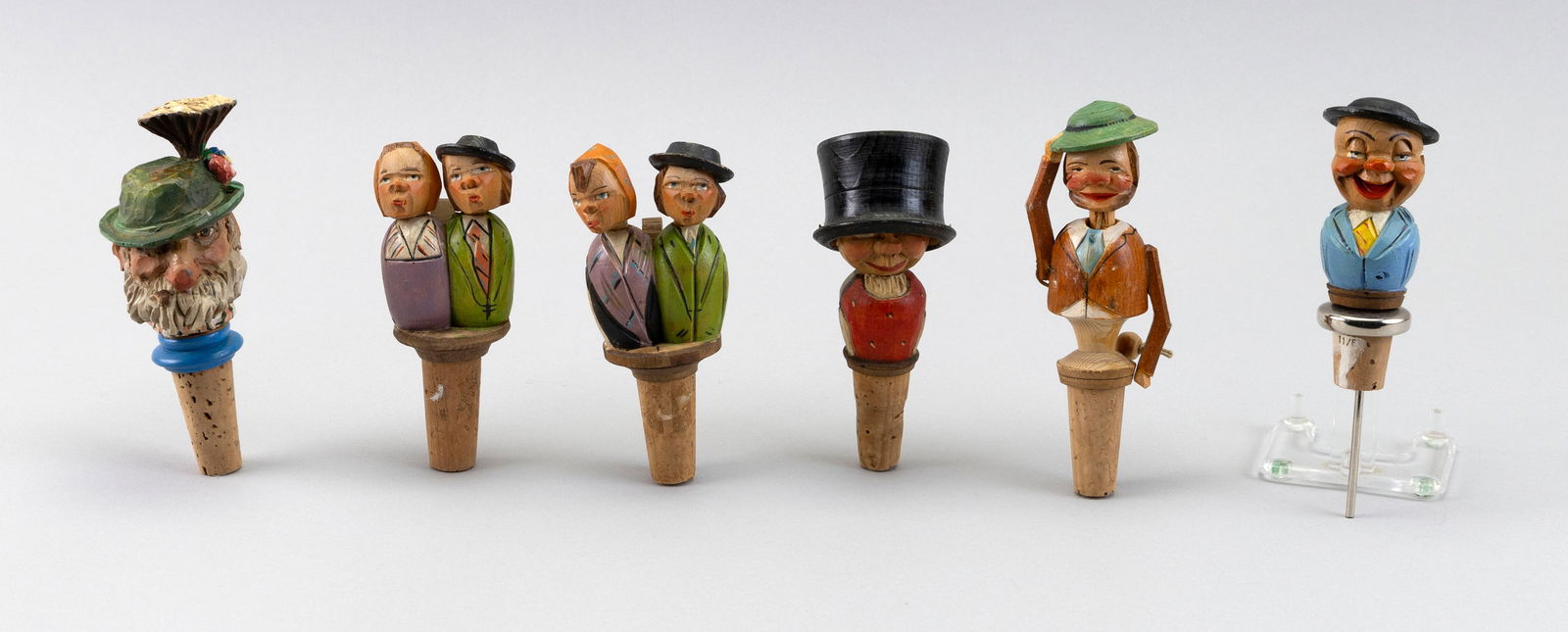 SIX ITALIAN/GERMAN CARVED AND POLYCHROMED WOODEN FIGURAL WINE STOPPERS 20th Century Heights approx. (1 of 3)