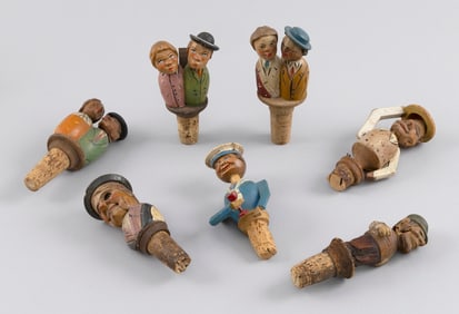 SEVEN GERMAN/ITALIAN CARVED AND POLYCHROMED WOODEN FIGURAL WINE STOPPERS 20th Century Heights