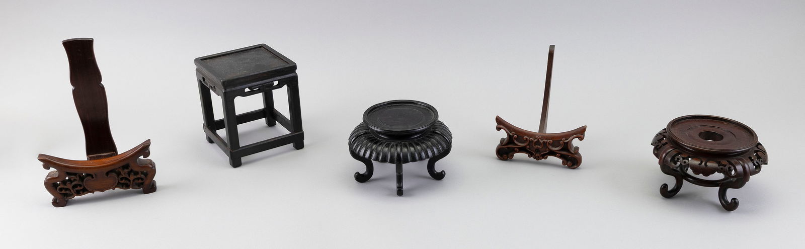 FIVE CHINESE CARVED WOOD STANDS Early 20th Century Heights from 4" to 8". (1 of 6)