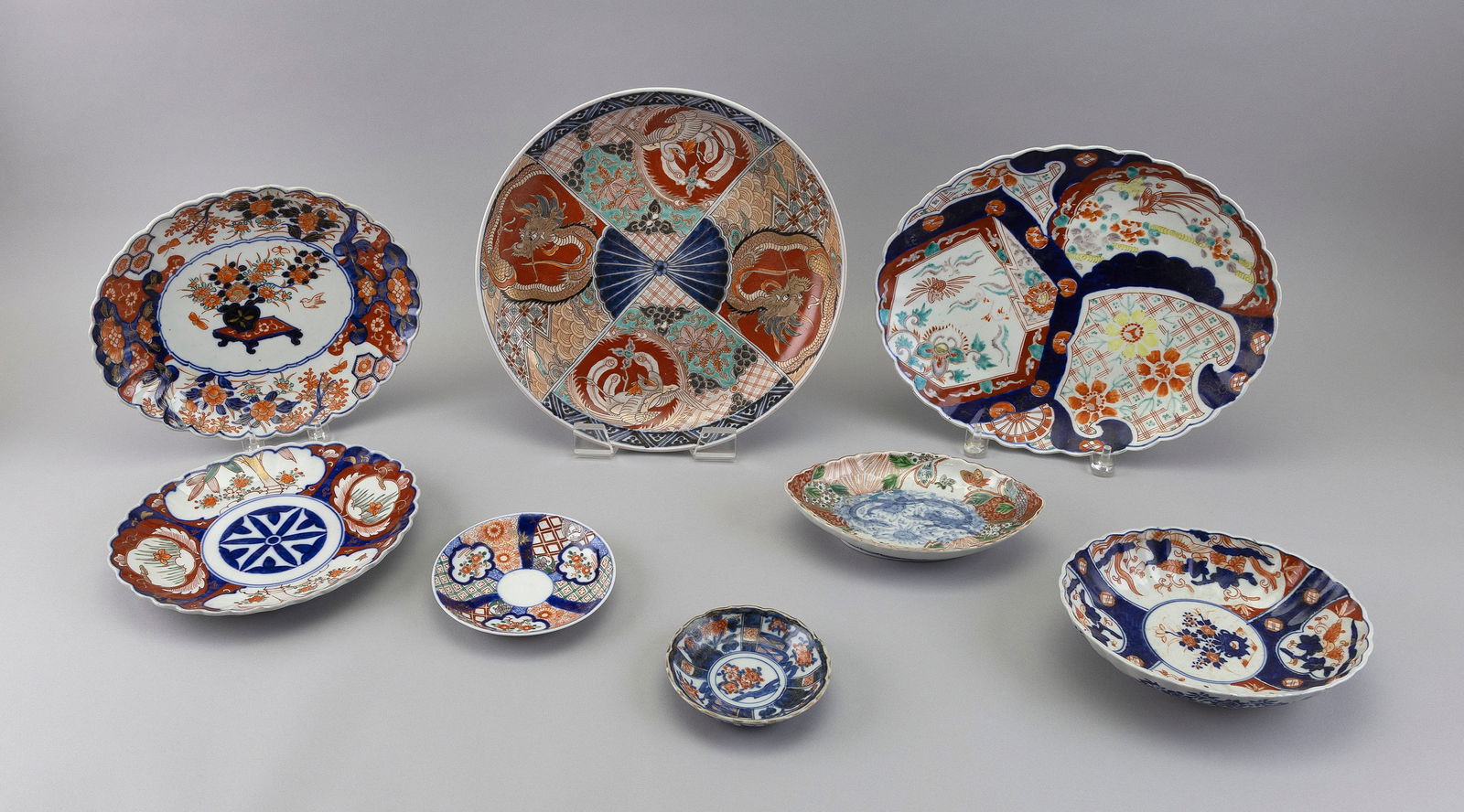 EIGHT PIECES OF JAPANESE IMARI PORCELAIN Late 19th/Early 20th Century Lengths from 4.5" to 12.5". (1 of 2)