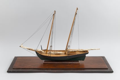 CASED MODEL OF A TWO-MASTED SAILING VESSEL 20th Century Case height 20". Length 30". Width 10".