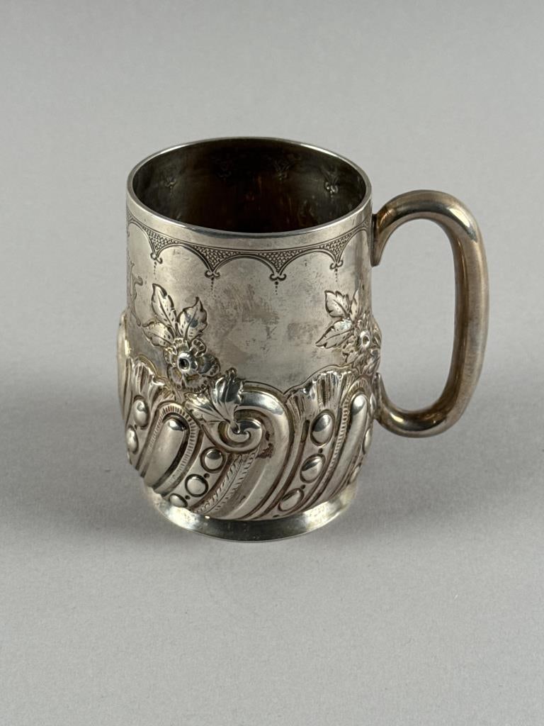 VICTORIAN ENGLISH STERLING SILVER MUG, London, Late 19th Century Approx. 4.7 troy oz.: VICTORIAN ENGLISH STERLING SILVER MUG London, Late 19th Century Untraced maker's mark "GMJ". Date letter for 1892. Height 3.75". Approx. 4.7 troy oz.