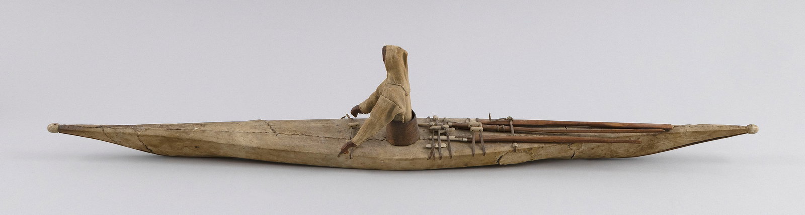 ESKIMO MODEL OF A KAYAK WITH HUNTER First Half of the 20th Century Length 24". (1 of 5)