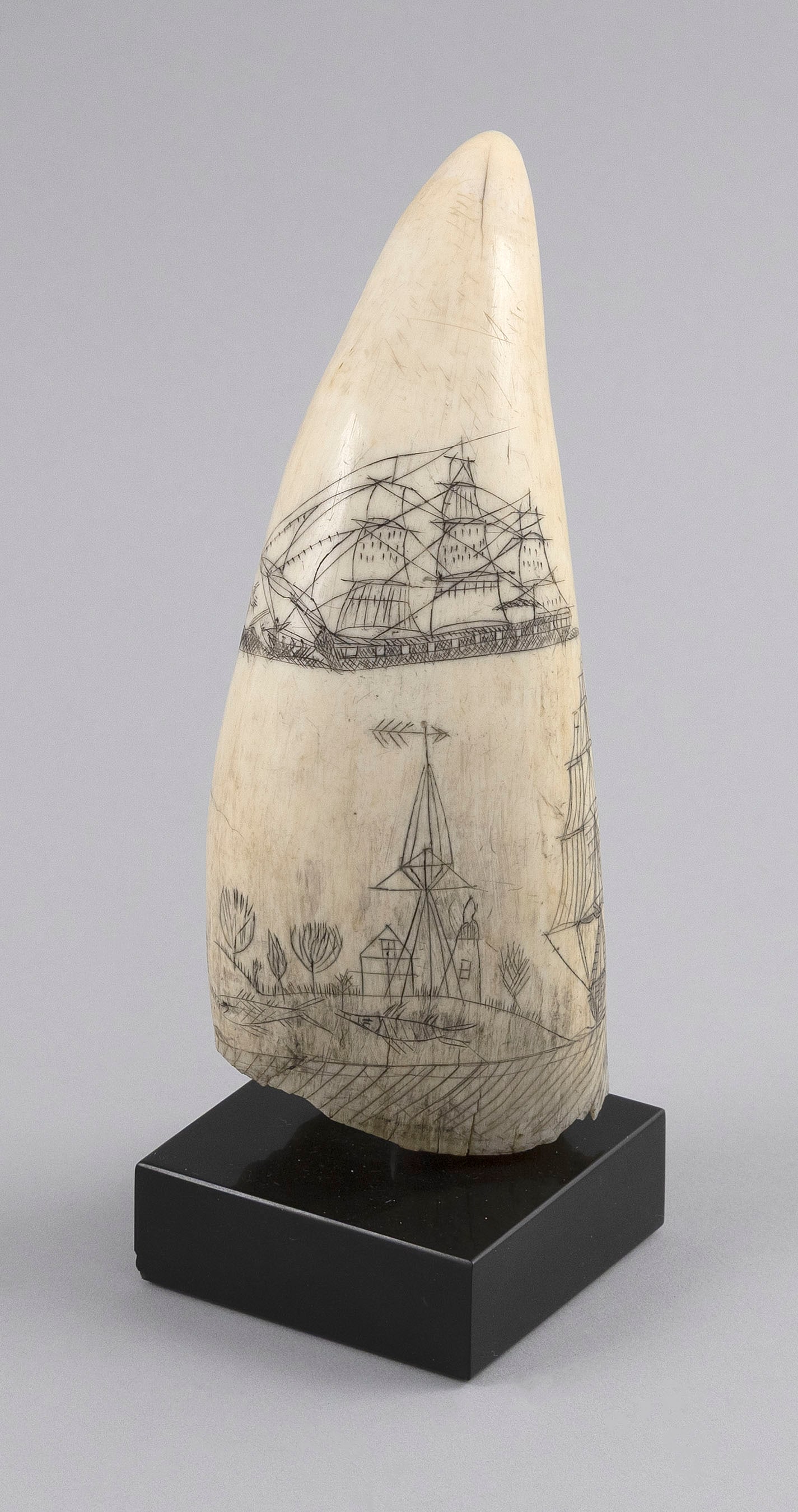 SCRIMSHAW WHALE'S TOOTH WITH WHALING AND OTHER SCENES Mid-19th Century Length 5.75". With stand. (1 of 1)