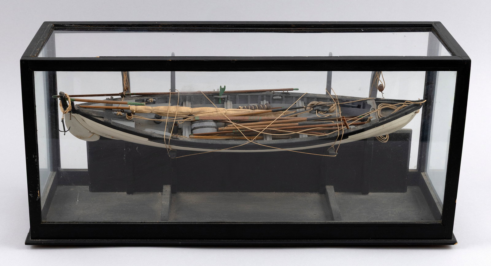ELMER F. TANNER CASED MODEL OF A WHALEBOAT Massachusetts, Early 20th Century Case height 8.5". (1 of 1)