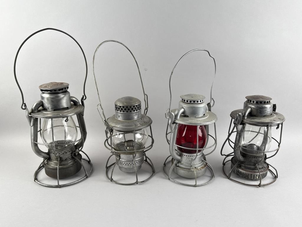 FOUR DIETZ RAILROAD LANTERNS Late 19th/Early 20th Century Heights from 10" to 11.25". (1 of 3)