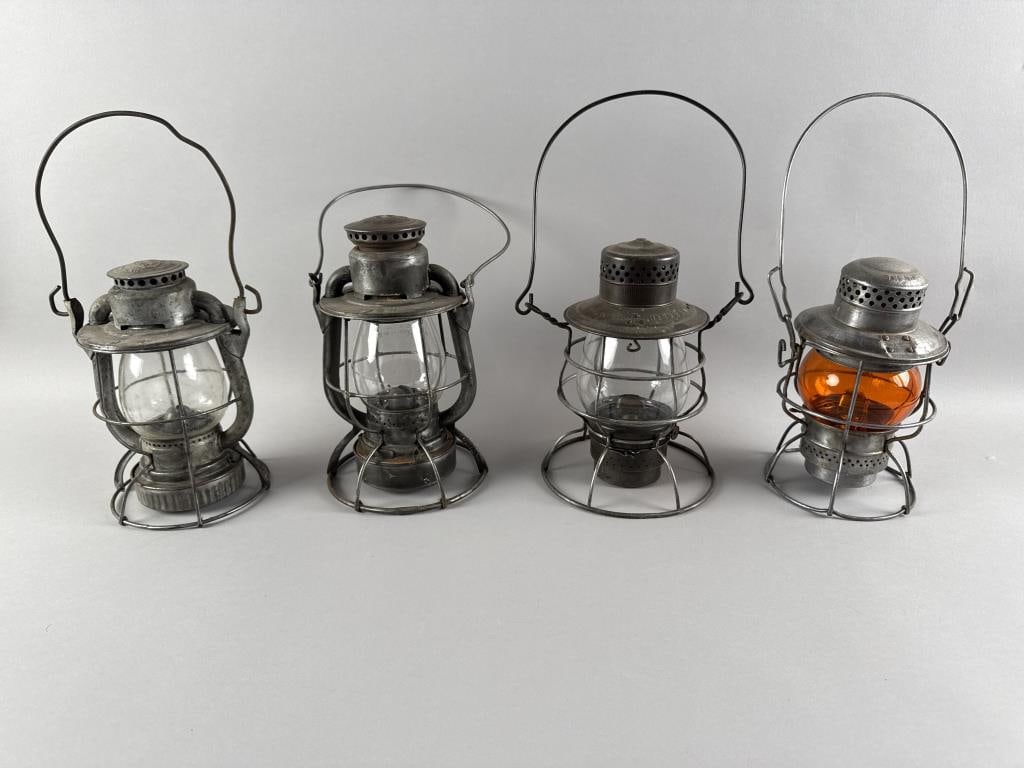 FOUR RAILROAD LANTERNS Late 19th/Early 20th Century Heights from 10" to 11.5". (1 of 2)