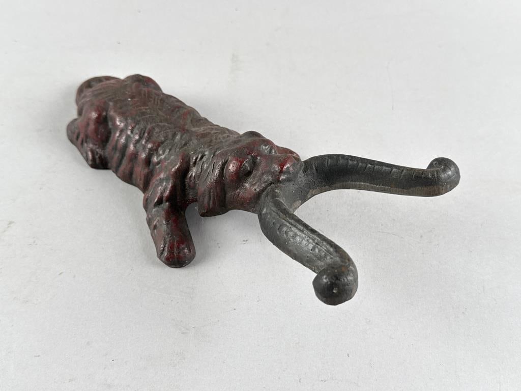 CAST IRON RECLINING DOG BOOTJACK Early 20th Century Length 10.75". (1 of 3)