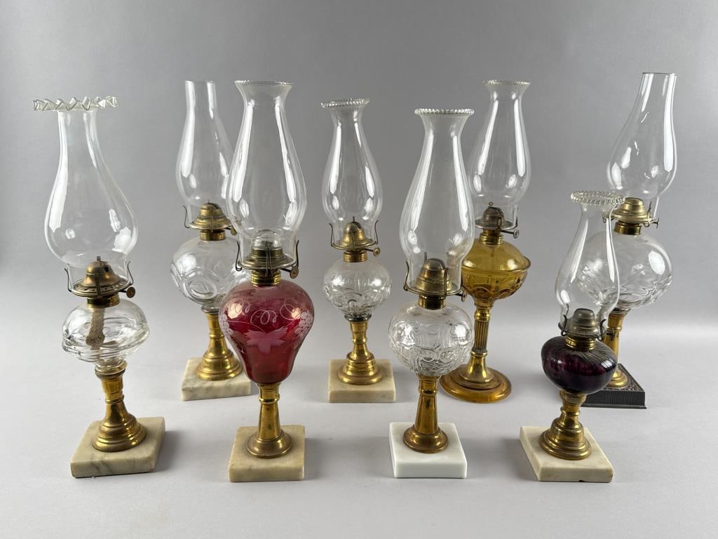 EIGHT FLUID LAMPS WITH GLASS FONTS Late 19th/Early 20th Century Heights including chimneys from 14" (1 of 3)