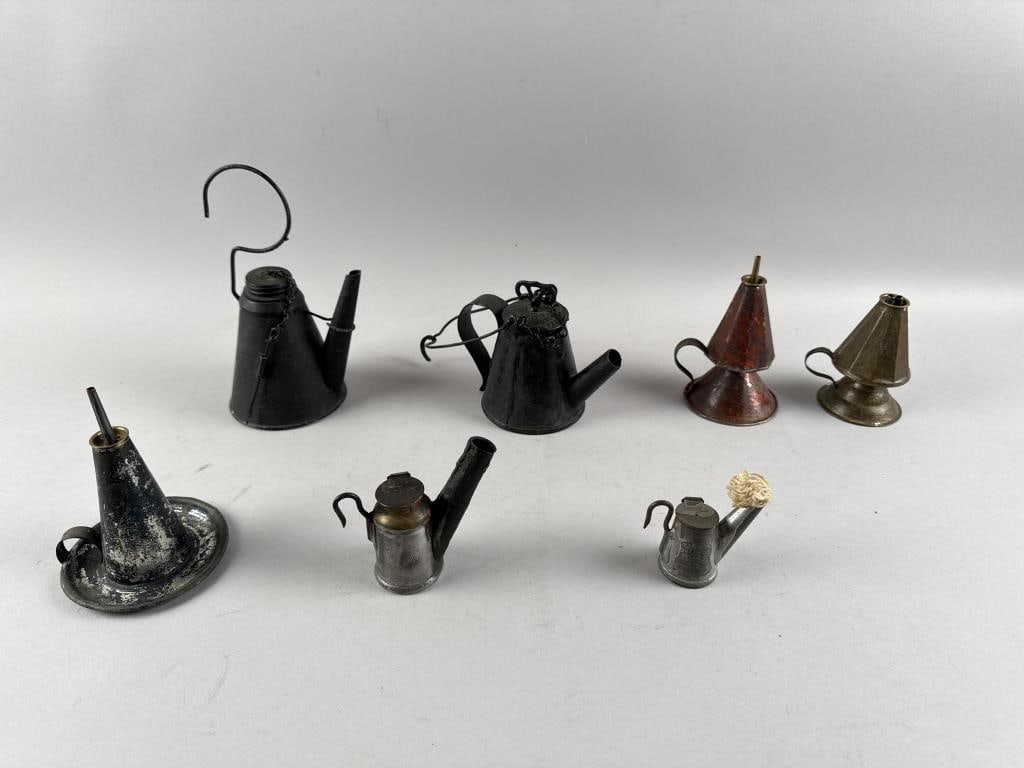 SEVEN TIN OIL LAMPS Early 19th Century Heights from 3" to 5".: SEVEN TIN OIL LAMPSEarly 19th CenturyHeights from 3" to 5".