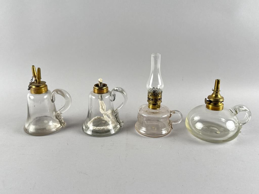FOUR CLEAR GLASS FINGER LAMPS 19th Century Heights from 4.75" to 6.25". (1 of 3)