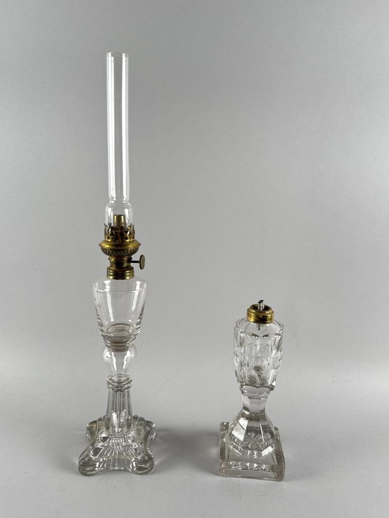 TWO CLEAR GLASS OIL LAMPS 19th Century Heights 9.25" and 13.5". (1 of 3)