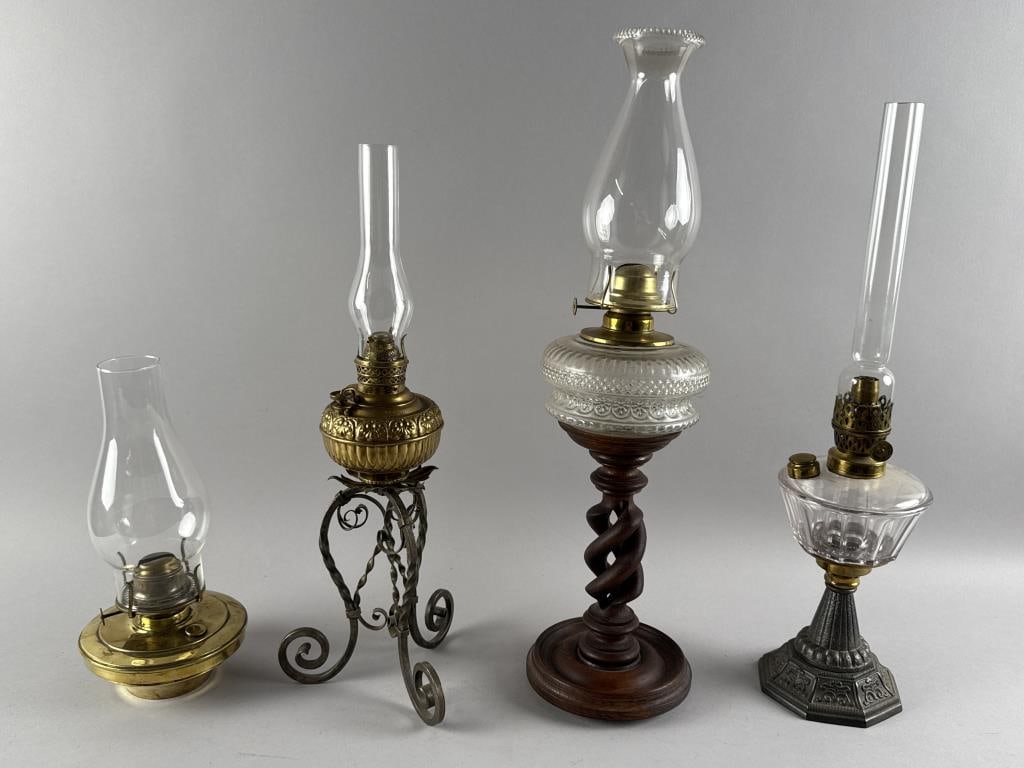FOUR OIL LAMPS 19th Century Heights from 12" to 22.25". Widths from 5" to 7". (1 of 5)