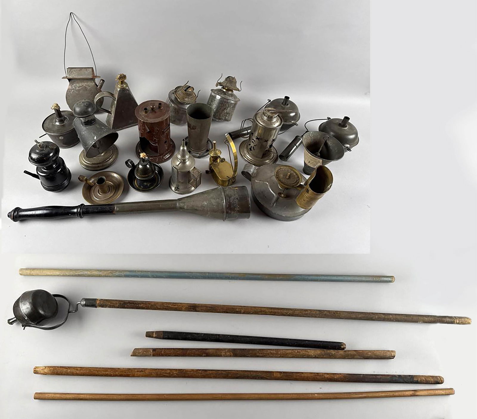 APPROX. 25 TIN AND BRASS LAMPS 19th/Early 20th Century Heights to approx. 23".: APPROX. 25 TIN AND BRASS LAMPS19th/Early 20th CenturyIncludes finger lamps, parade lanterns, etc.Heights to approx. 23".