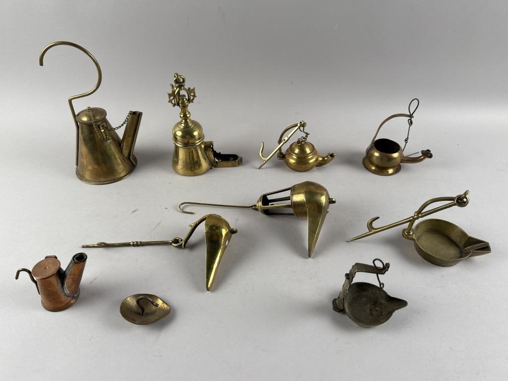 TEN ASSORTED BRASS AND COPPER LAMPS First Half of the 19th Century Heights from 3.5" to 8.5".: TEN ASSORTED BRASS AND COPPER LAMPSFirst Half of the 19th CenturyHeights from 3.5" to 8.5".