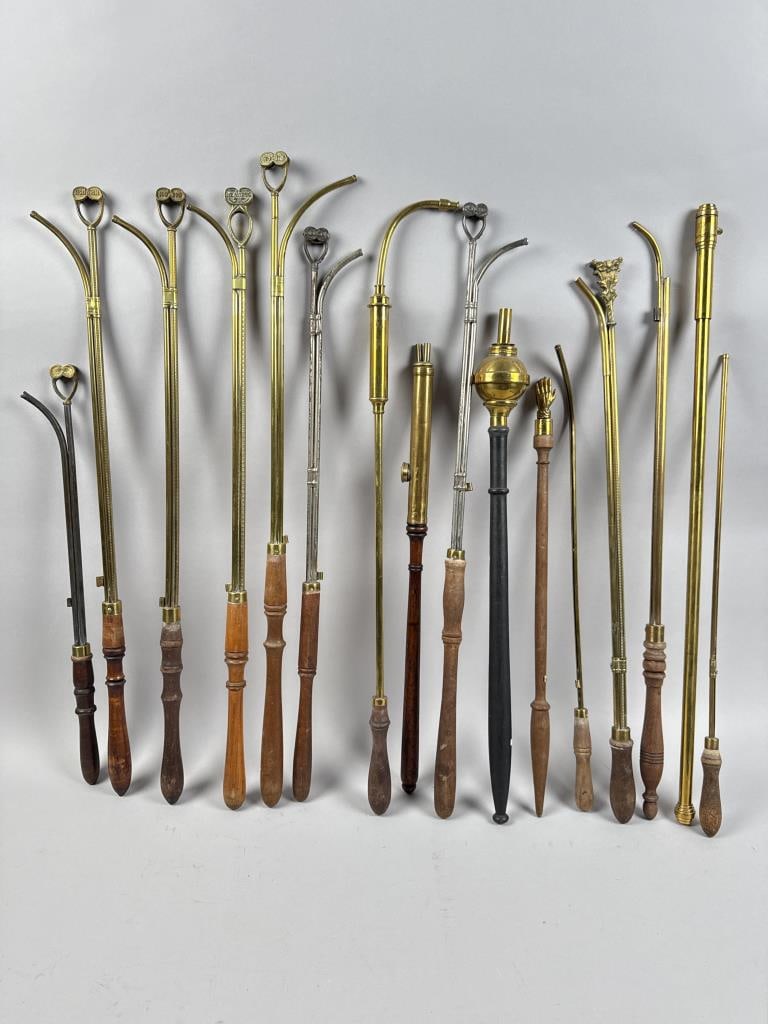 SIXTEEN LAMP LIGHTERS Late 19th/Early 20th Century Lengths to approx. 30". (1 of 4)