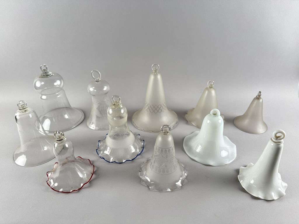 ELEVEN SMOKE BELLS 19th Century Heights from 6" to 9.5". Diameters from 4.75" to 7.25".: ELEVEN SMOKE BELLS19th Century1-3) Three clear glass, one with a pink ruffled edge.4-5) Two milk glass, both with ruffled edges.6-7) Two frosted glass, one with a ruffled edge.8-10) Three frosted and