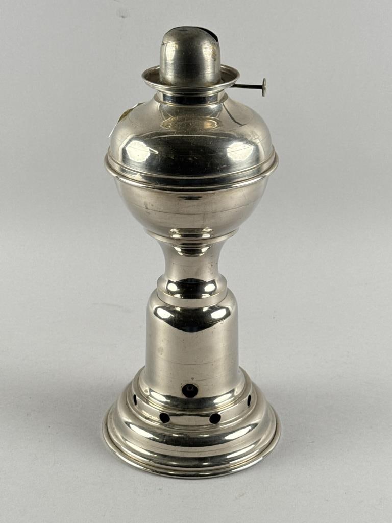 TIME LAMP WITH CLOCKWORK MECHANISM Late 19th/Early 20th Century Height 13". (1 of 2)