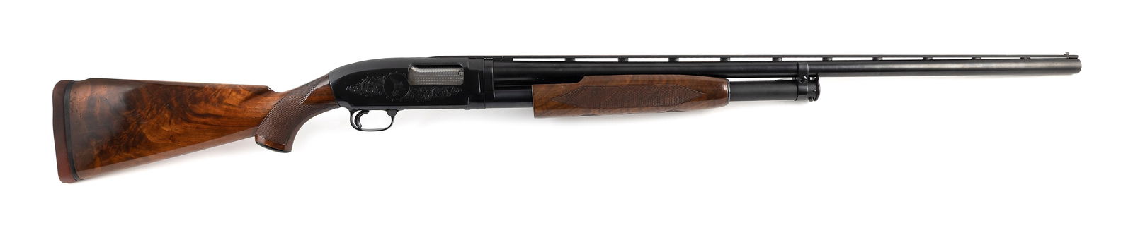 * WINCHESTER MODEL 12 SLIDE-ACTION SHOTGUN 20th Century Length of pull 14". Length of barrel 30".: * WINCHESTER MODEL 12 SLIDE-ACTION SHOTGUN20th Century12-ga., Serial #1915497. Choked Full. Vent ribbed barrel. Receiver engraved with mallards.* This gun will only be delivered to holders of a Federa