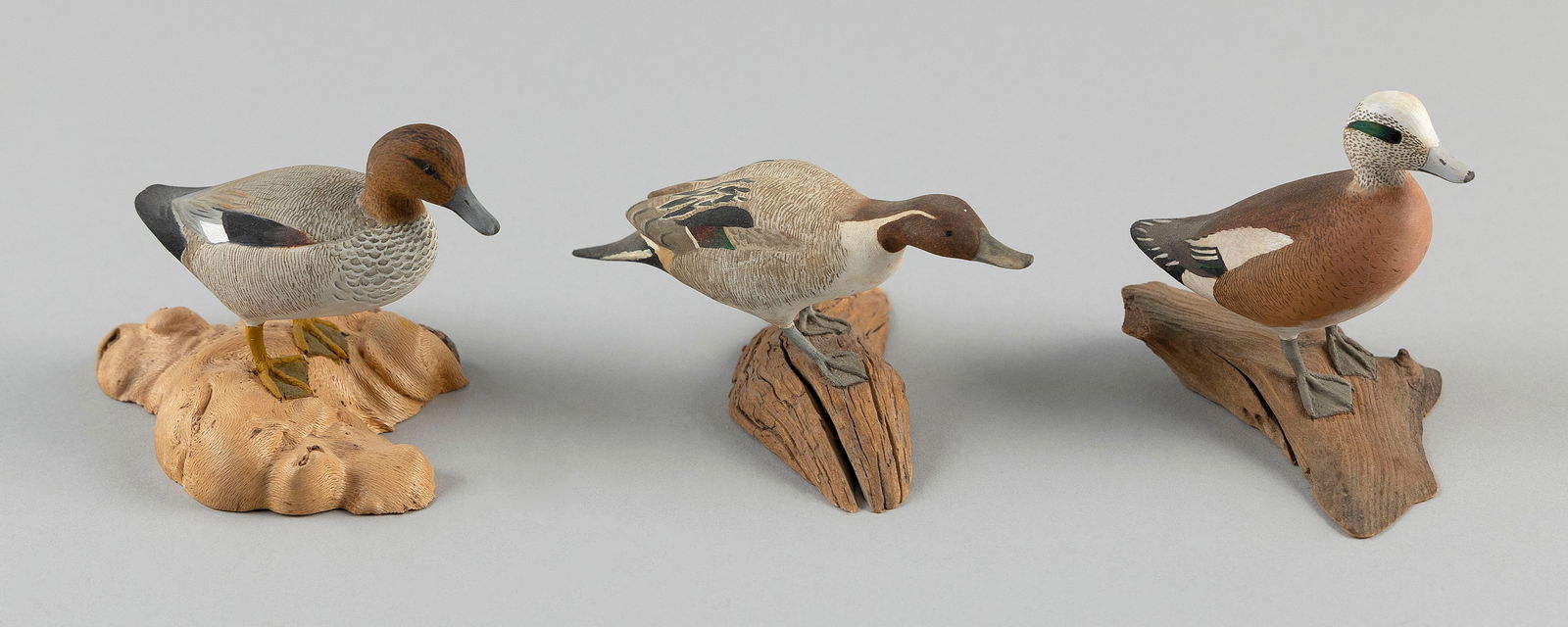 THREE HAROLD GIBBS MINIATURE PUDDLE DUCKS Barrington, Rhode Island, 1886-1970 Heights 2" and 3". (1 of 3)