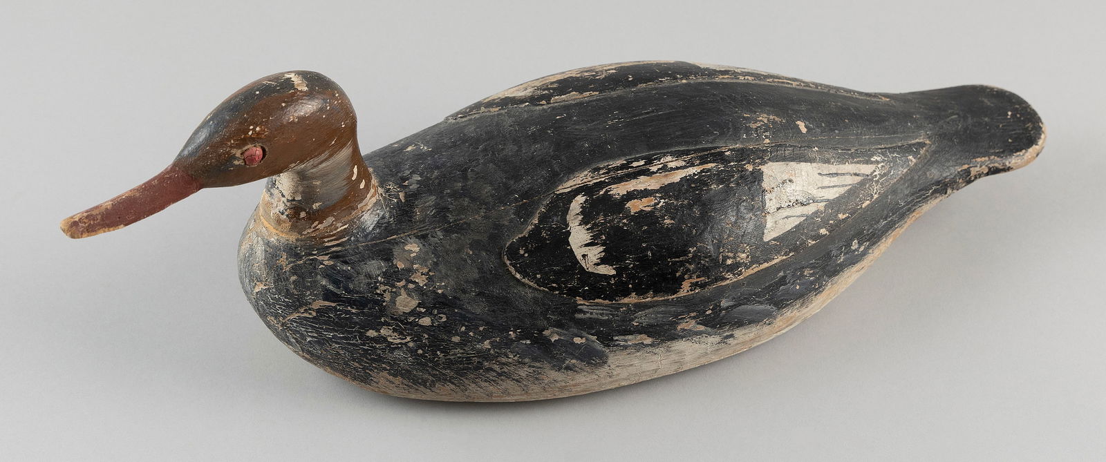 LUTHER NICKERSON RED-BREASTED MERGANSER DECOY Cotuit, Massachusetts, Early 20th Century Length 18". (1 of 3)