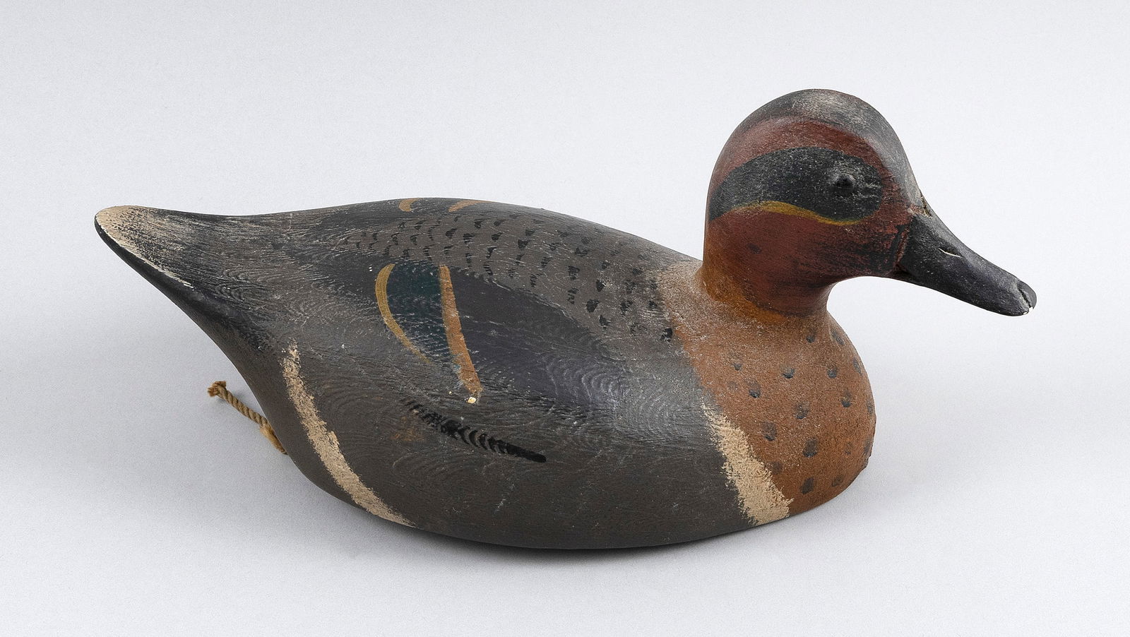 SAINT CLAIR FLATS-STYLE GREEN-WINGED TEAL DECOY 20th Century Length 10.5".: SAINT CLAIR FLATS-STYLE GREEN-WINGED TEAL DECOY20th CenturyHollow-carved. Glass eyes.Length 10.5".