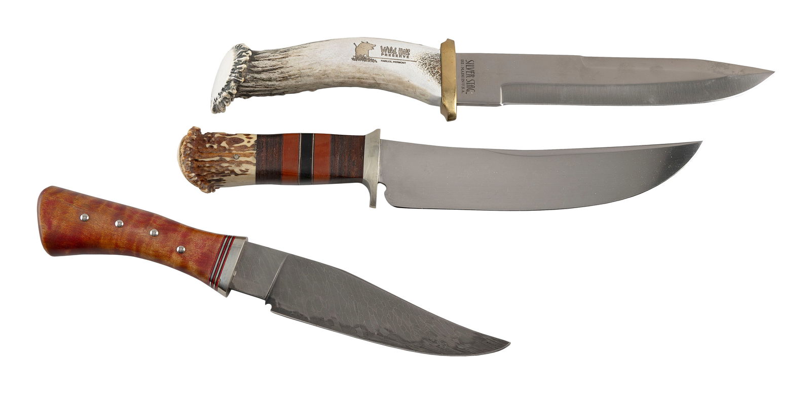 THREE COLLECTIBLE KNIVES 20th Century: THREE COLLECTIBLE KNIVES20th Century1) Frank Gamble with stag horn and leather handle. Length 12.5".2) Wild Hill Silver with stag horn handle. Length 13.5".3) Red St. Cyr with hardwood handle. Length