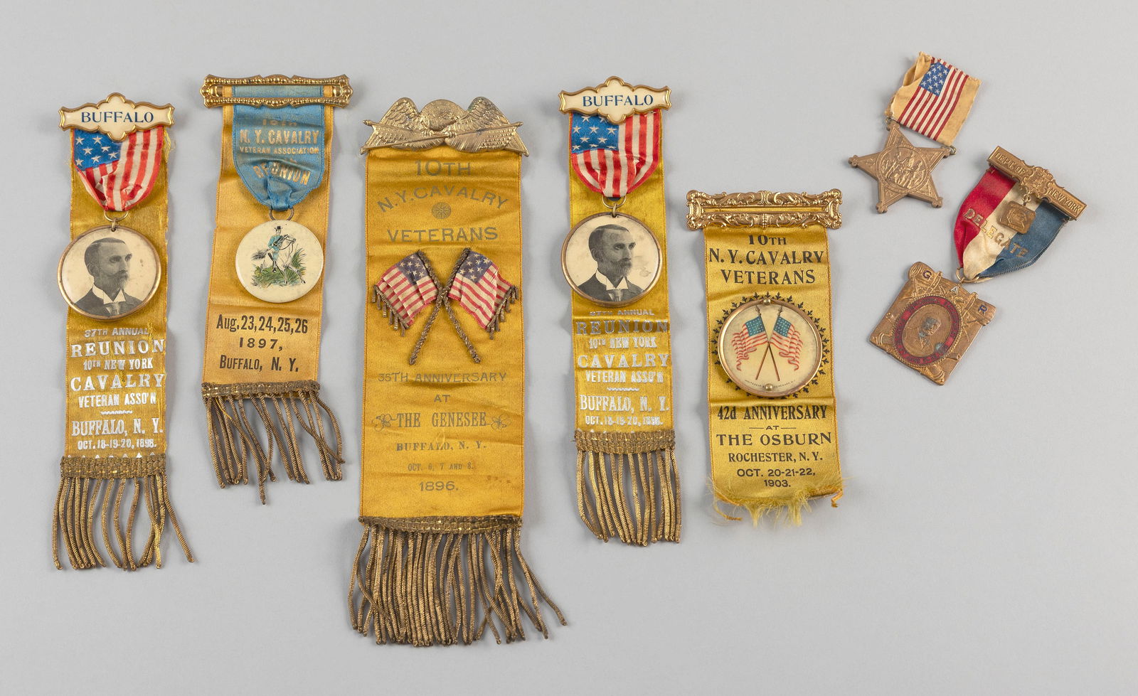 SEVEN GRAND ARMY OF THE REPUBLIC MEDALS AND RIBBONS Late 19th/Early 20th Century Lengths from 3" to: SEVEN GRAND ARMY OF THE REPUBLIC MEDALS AND RIBBONSLate 19th/Early 20th CenturyAll from New York units.Lengths from 3" to 10".