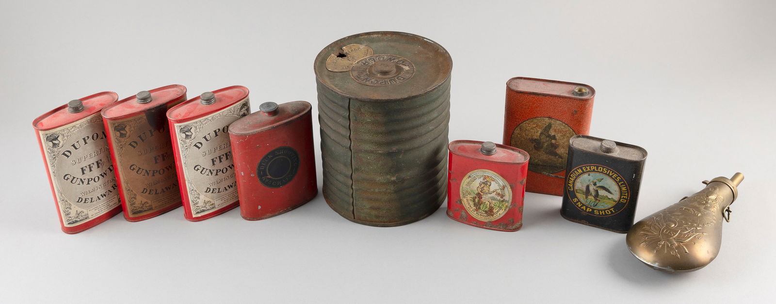 COLLECTION OF POWDER TINS, KEGS AND FLASK 19th Century Lengths from 4" to 8.5". (1 of 2)