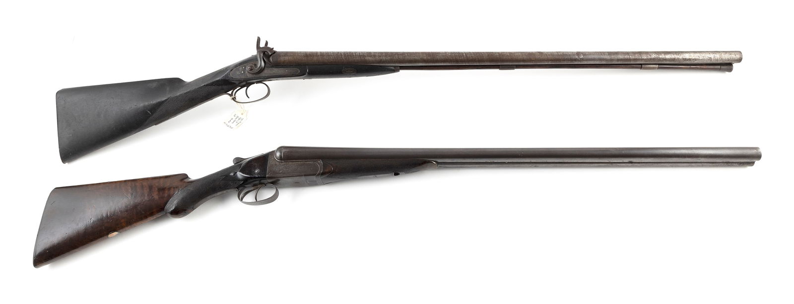 TWO DAMASCUS BARREL SHOTGUNS 19th Century: TWO DAMASCUS BARREL SHOTGUNS19th Century1) W.W. Greener. 12-ga., Serial #20604. Length of barrels 30". Total lengths 46.5". 2) William Reid. 10-ga. Length of barrels 33". Total length 49".It is the bi