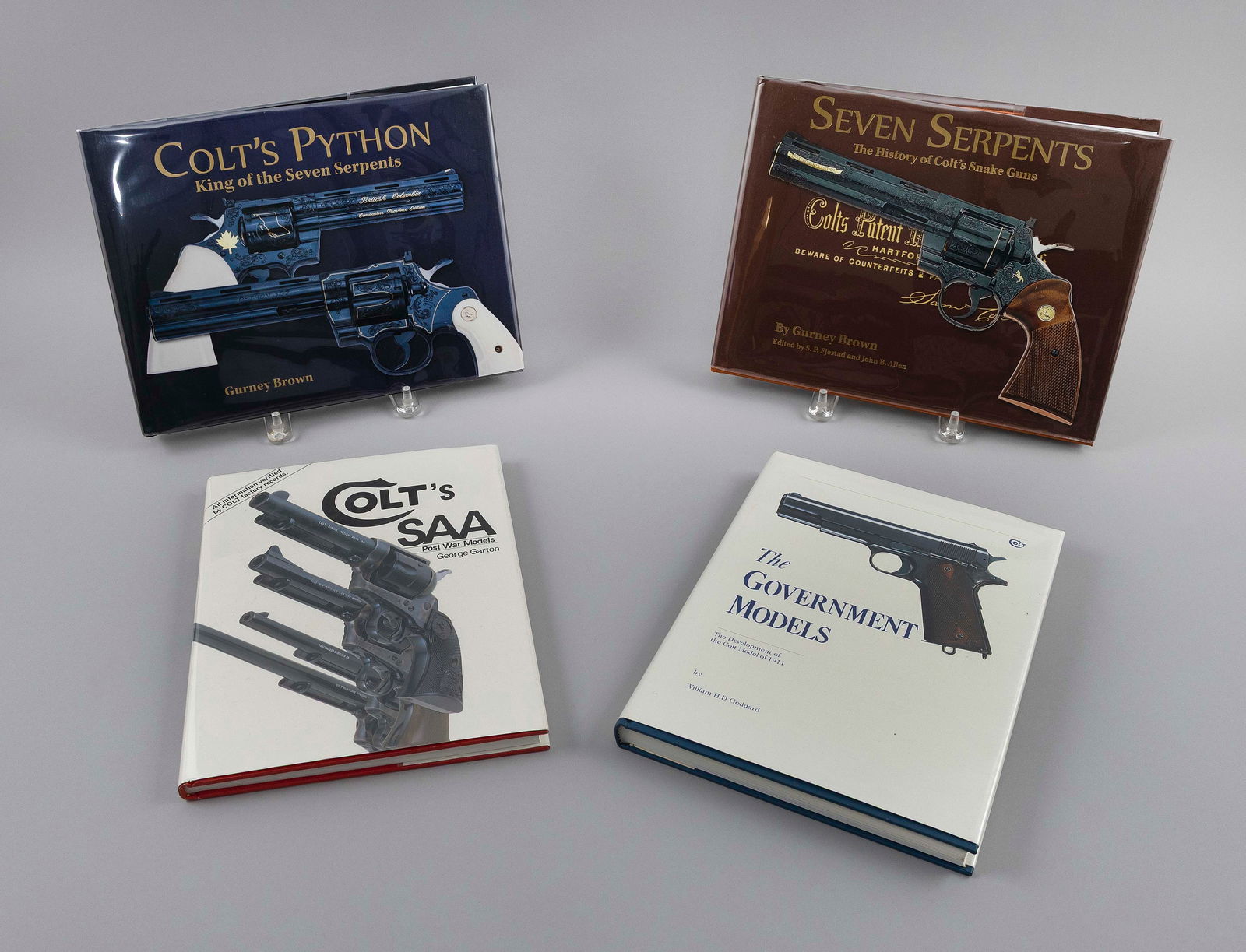 FOUR BOOKS ON COLT GUNS 20th Century Largest 9.5" x 12".: FOUR BOOKS ON COLT GUNS20th Century1) Seven Serpents:The History of Colt's Snake Guns by Gurney Brown. 2) Colt's Python: King of the Seven Serpents by Gurney Brown.3) Colt's SAA: Post War Models
