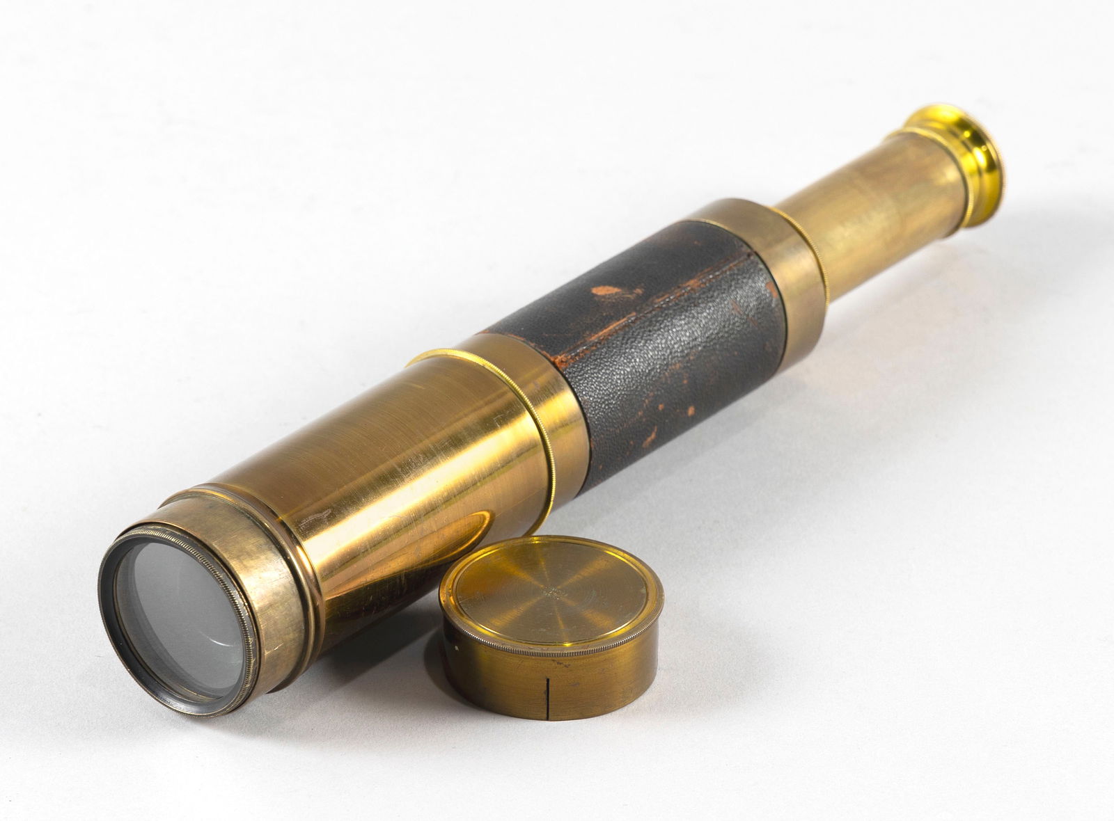 LEATHER-WRAPPED BRASS FOUR-DRAW TELESCOPE France, Late 19th/Early 20th Century Length closed 9.5". (1 of 3)