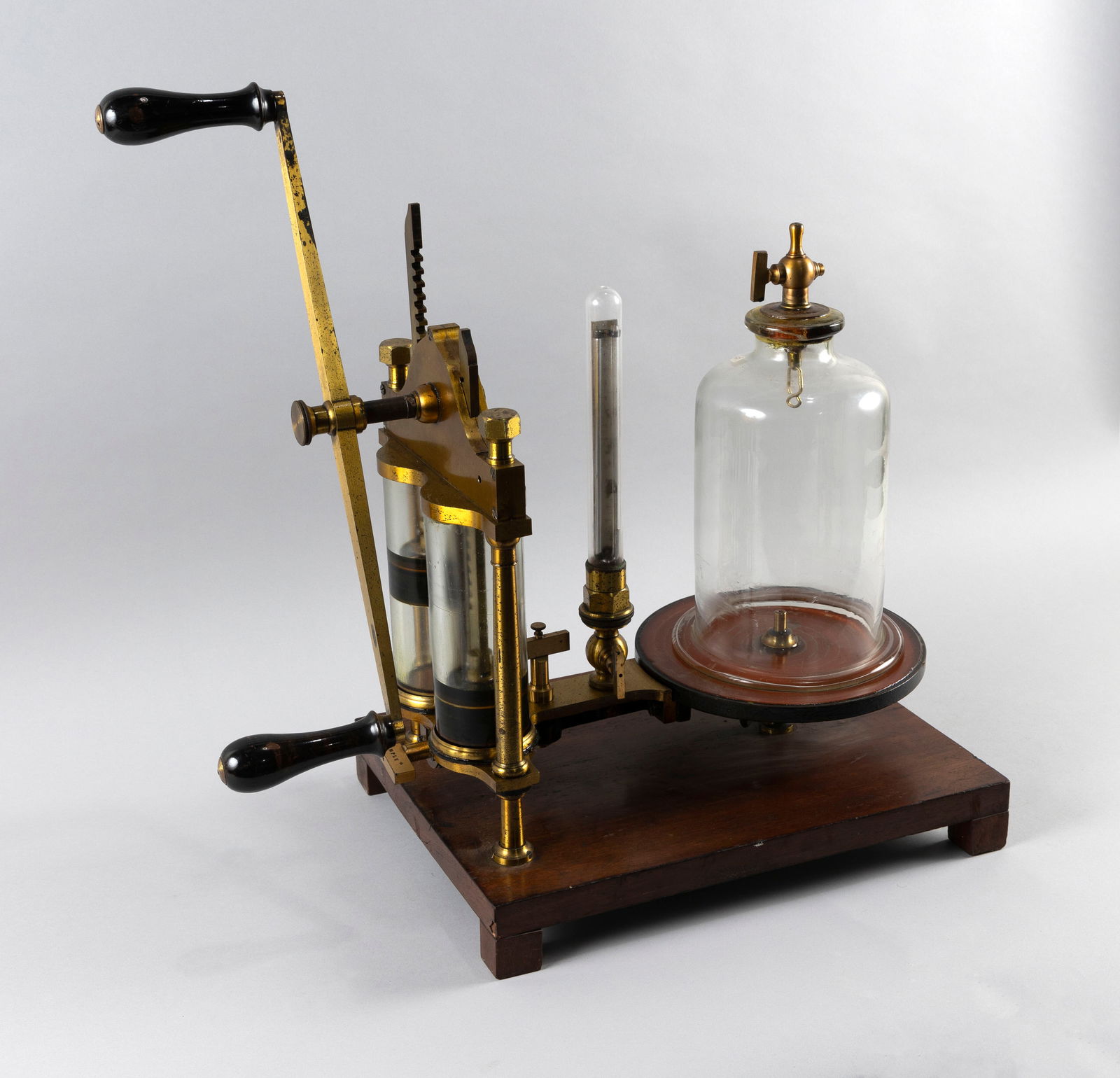 VACUUM AIR PUMP, POSSIBLY BY JACQUES BABINET France, Late 19th Century Height 19". Length 16". Width: VACUUM AIR PUMP, POSSIBLY BY JACQUES BABINETFrance, Late 19th CenturyApparatus also associated with Adolphe Ganot. Adjustment knob marked "Babinet", "Ferme" and "Simple", otherwise unmarked.Height 19"