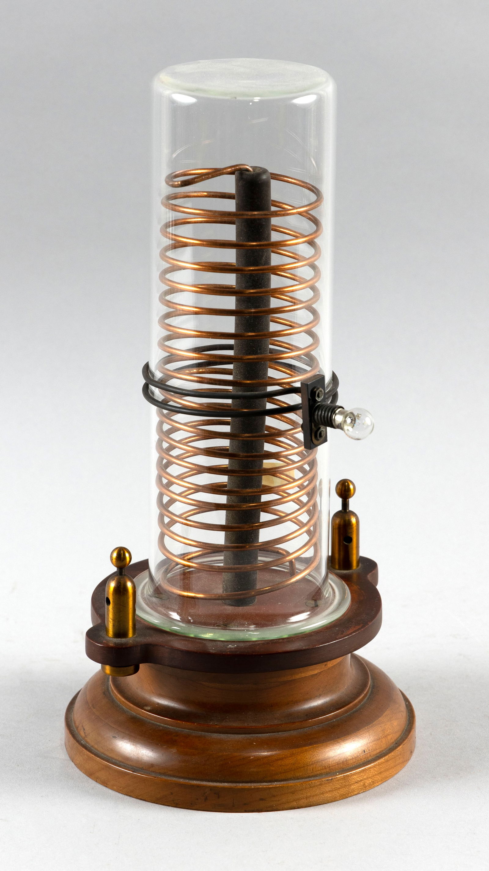 MAX KOHL TESLA INDUCTION COIL Germany, Late 19th Century Height 12.75". Diameter at base approx.: MAX KOHL TESLA INDUCTION COILGermany, Late 19th CenturySigned "Max Kohl" on underside of the turned wood base.Height 12.75". Diameter at base approx. 6.5".