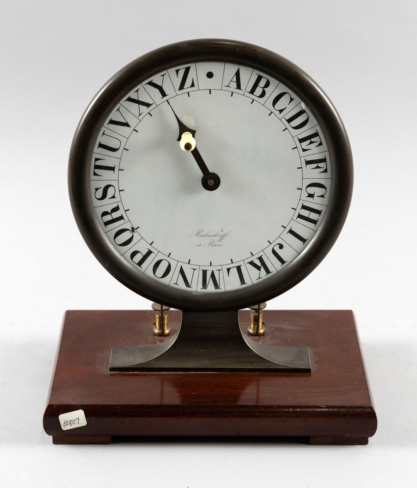 RARE RUHMKORFF ALPHABET DIAL TELEGRAPH France, 19th Century Height 12". Dial diameter approx. 8.5".: Y Y RARE RUHMKORFF ALPHABET DIAL TELEGRAPHFrance, 19th CenturySmall ivory knob on dial hand. Marked on dial "Ruhmkorff a Paris". Mounted on a mahogany base.Height 12". Dial diameter approx. 8.5". CITE