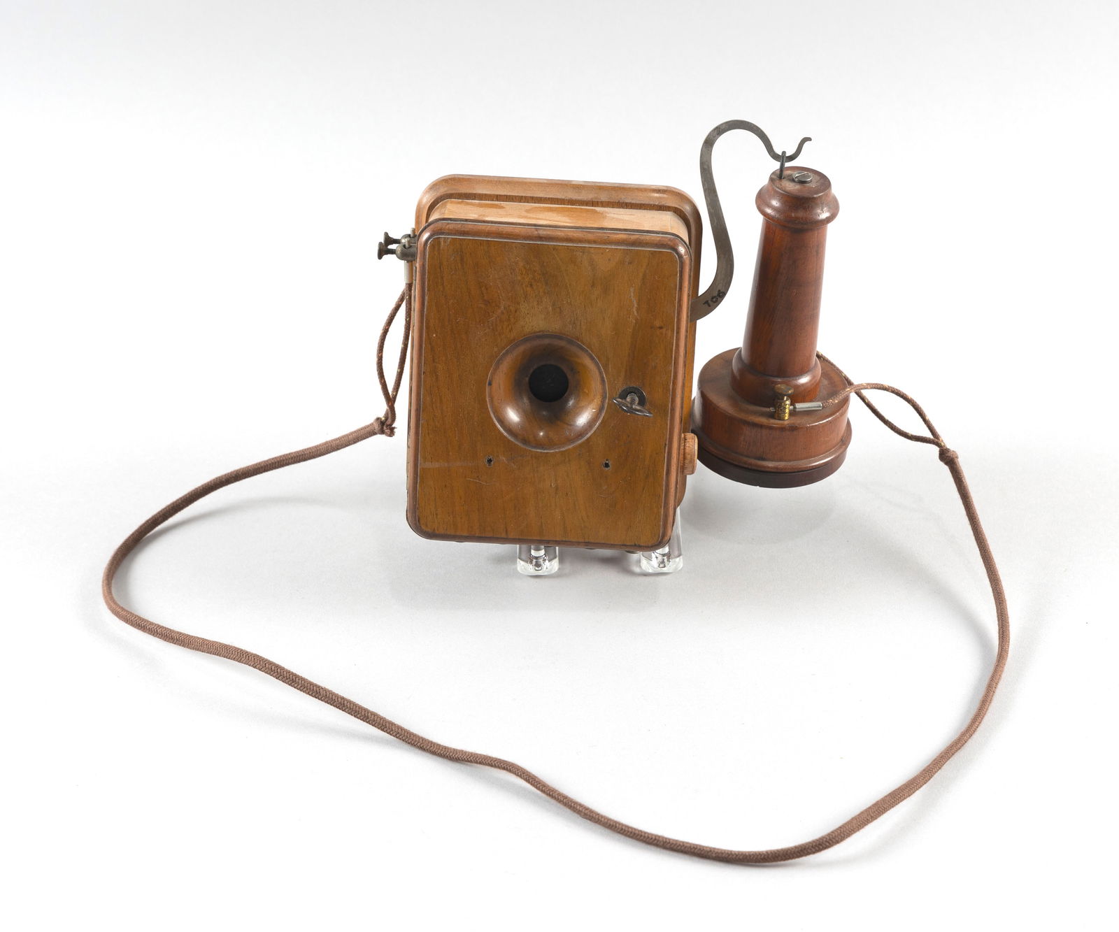 RARE BLAKE TELEPHONE WITH S-SHAPED MOUTHPIECE HOLDER Massachusetts, Late 19th Century Transmitter: RARE BLAKE TELEPHONE WITH S-SHAPED MOUTHPIECE HOLDERMassachusetts, Late 19th CenturyImpressed "3" on back but otherwise unmarked.Transmitter box height 6.75" (not including hook). Width 5.25". Depth 3