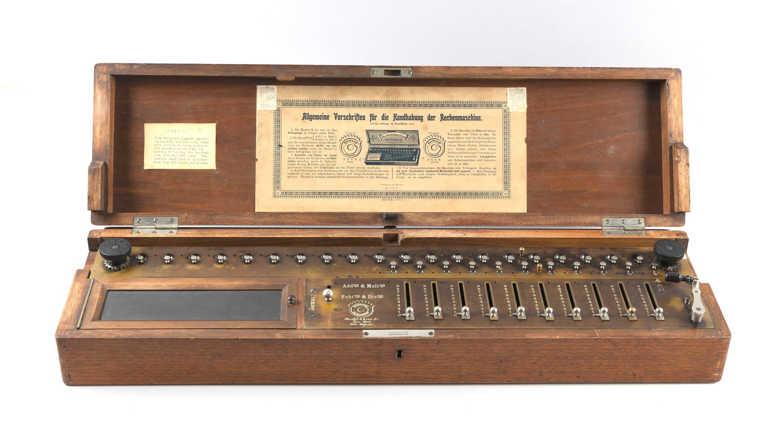 CASED BURKHARDT ARITHMOMETER Germany, Early 20th Century Case height 4". Width 28". Depth 7.75". (1 of 3)