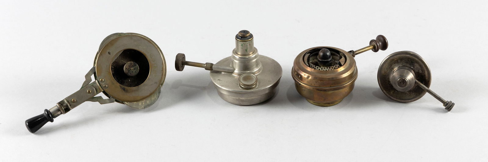 FOUR SMALL ALCOHOL BURNING STOVES AND BURNERS Late 19th/Early 20th Century Diameters from 2.5" to (1 of 6)