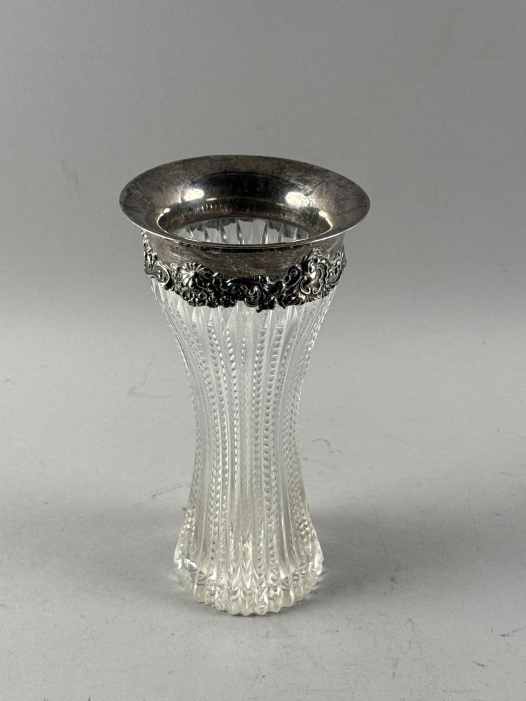 CUT GLASS VASE WITH STERLING SILVER RIM 20th Century Height 9.5".: CUT GLASS VASE WITH STERLING SILVER RIM20th CenturyHeight 9.5".