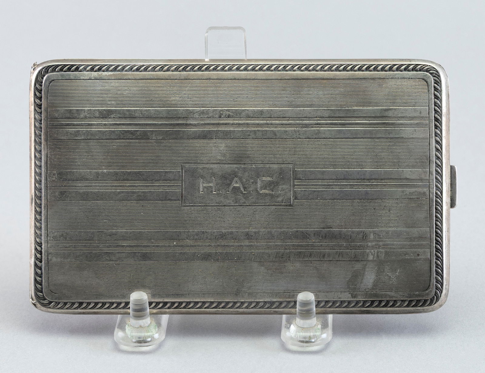 STERLING SILVER CIGARETTE CASE COMMEMORATING A REGATTA Circa 1929: STERLING SILVER CIGARETTE CASE COMMEMORATING A REGATTACirca 1929Monogrammed lid. Engraved on underside "Gold Cup Regatta Red Bank N.J. 1929 Stock Runabouts Not Over 250 H.P. Second Prize Won By Doozen