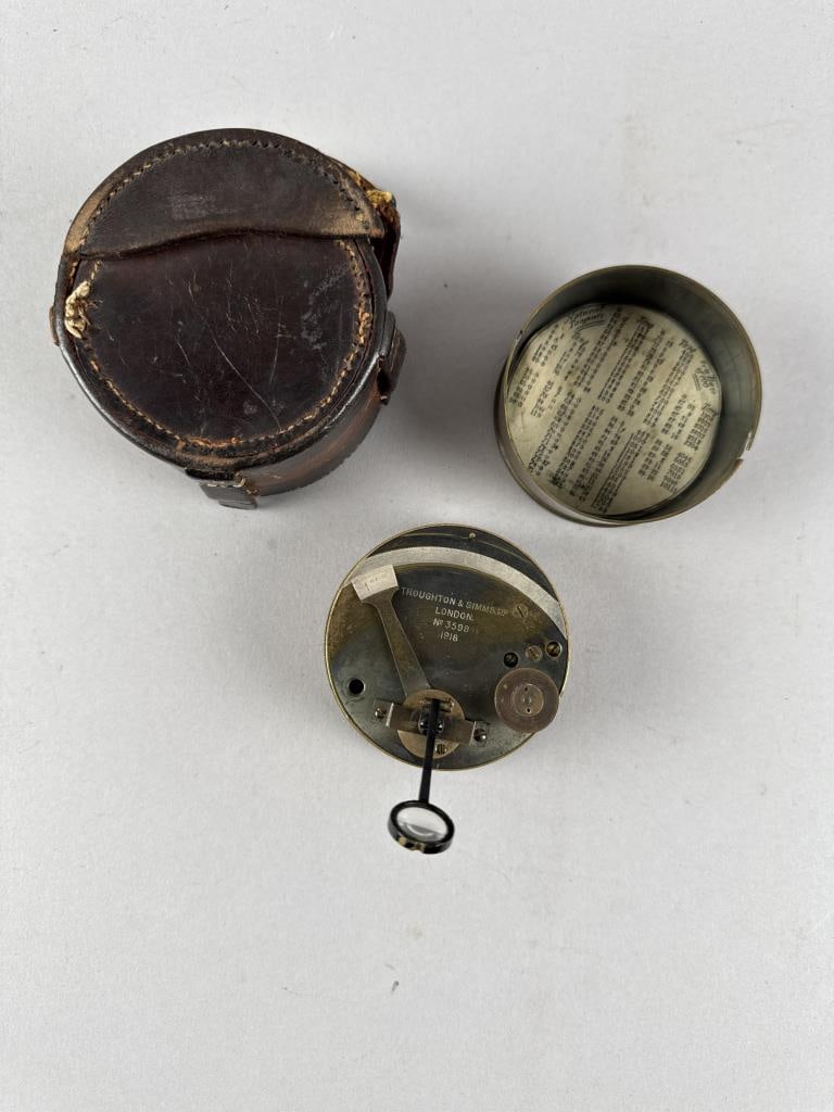 TROUGHTON & SIMMS BRASS POCKET COMPASS London, 19th Century Diameter 2.75".: TROUGHTON & SIMMS BRASS POCKET COMPASSLondon, 19th CenturyIn a fitted leather case.Diameter 2.75".