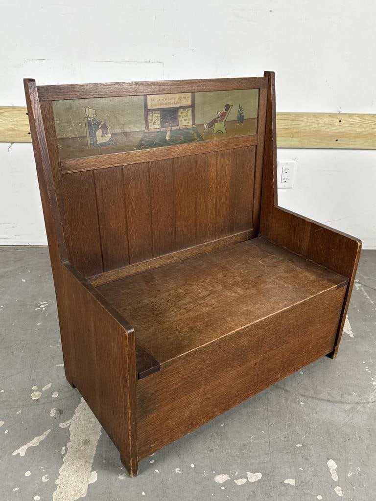 ARTS & CRAFTS PAINT-DECORATED QUARTER SAWN OAK CHILD'S SETTLE Early to Mid-20th Century Height 31".: ARTS & CRAFTS PAINT-DECORATED QUARTER SAWN OAK CHILD'S SETTLEEarly to Mid-20th CenturyBack rail with interior scene and "Be it ever so humble, there's no place like home". Lift-top seat conceals a sto